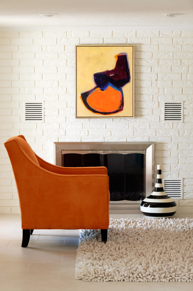 Living room - mid-sized eclectic open concept ceramic tile living room idea in Little Rock with beige walls and a standard fireplace