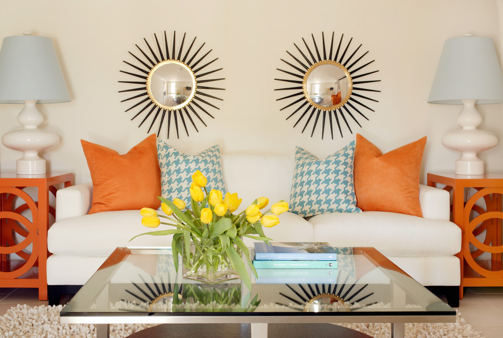 Inspiration for a mid-sized tropical open concept living room remodel in Little Rock with beige walls and no fireplace