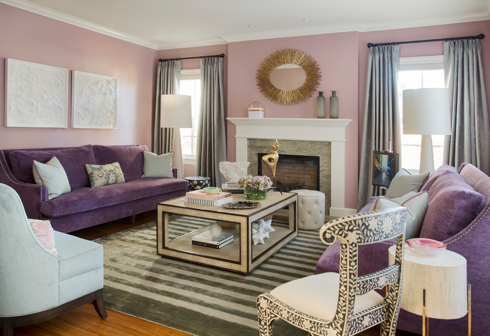 Idéer för ett mellanstort klassiskt separat vardagsrum, med ett finrum, rosa väggar, mellanmörkt trägolv, en standard öppen spis och en spiselkrans i sten
