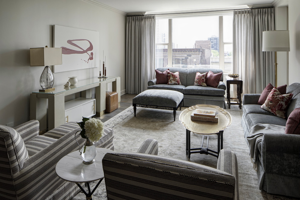 Идея дизайна: парадная, открытая гостиная комната среднего размера в стиле неоклассика (современная классика) с серыми стенами, паркетным полом среднего тона и серым полом без камина, телевизора