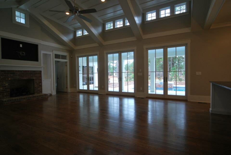 Example of a cottage living room design in Raleigh