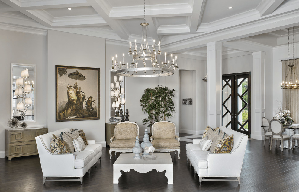 Immagine di un soggiorno chic aperto con sala formale, pareti beige e parquet scuro
