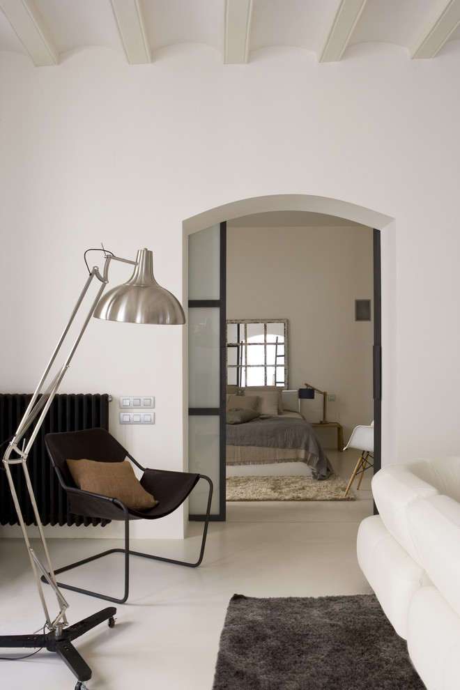 Ispirazione per un soggiorno minimal con pareti bianche e pavimento bianco