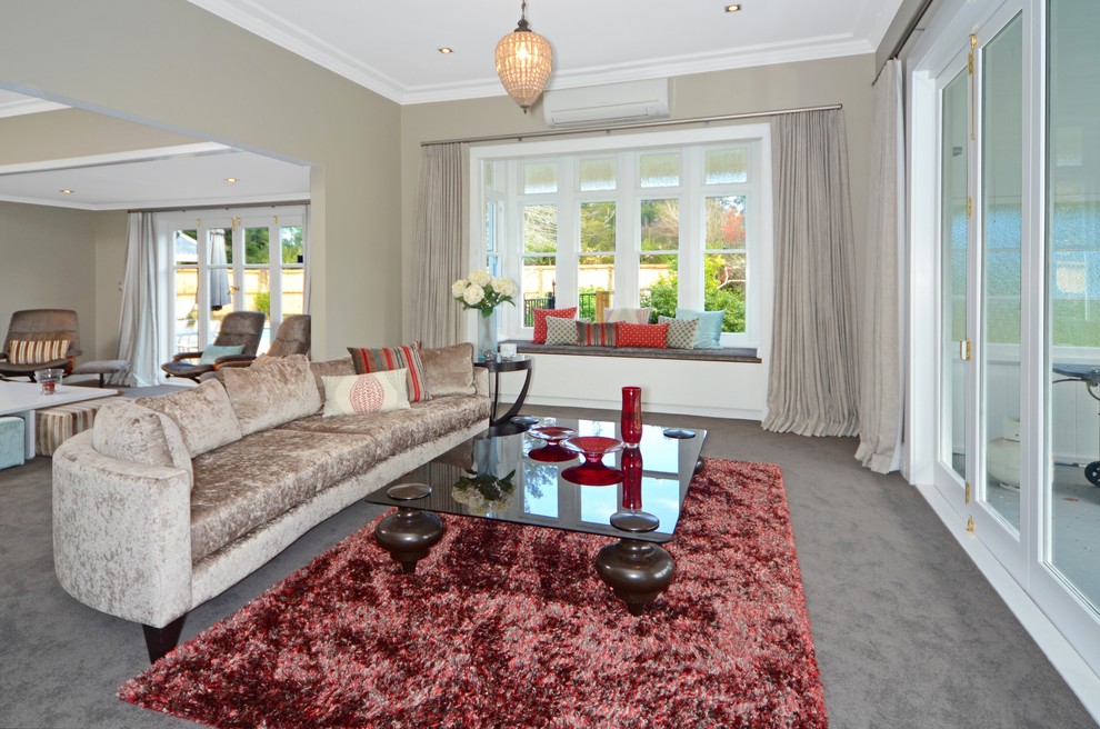 Mid-sized trendy formal and open concept carpeted living room photo in Auckland