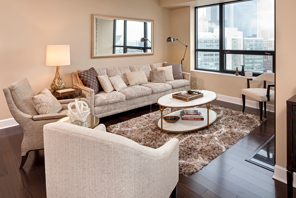 Photo of a medium sized contemporary living room in Minneapolis with beige walls, dark hardwood flooring, a standard fireplace, a tiled fireplace surround, a wall mounted tv and brown floors.