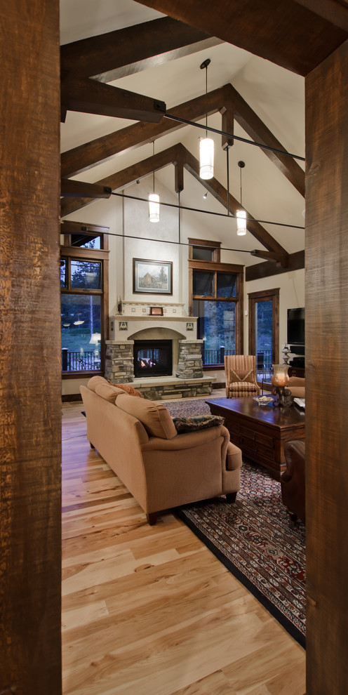 Design ideas for an expansive classic living room in Denver with a standard fireplace.