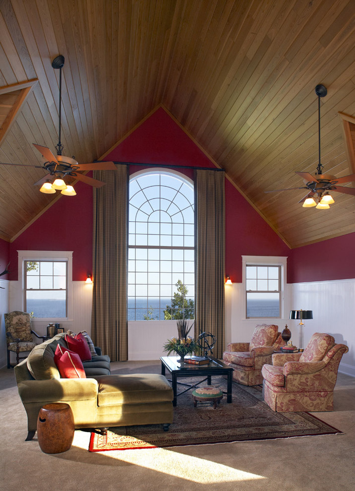 Foto de salón clásico con paredes rojas y cortinas