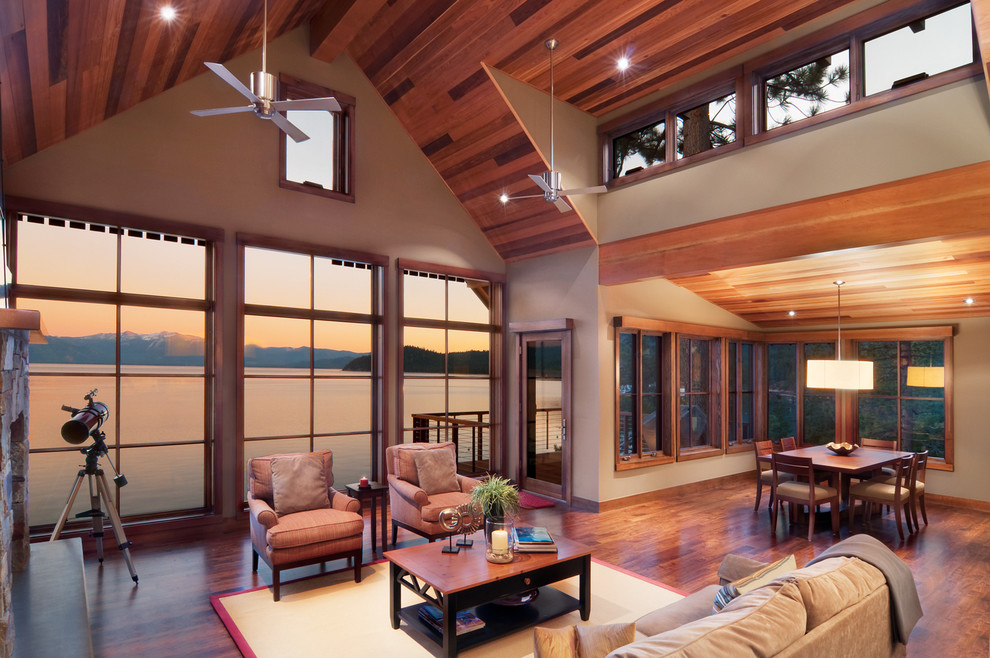 Foto di un soggiorno design aperto con pareti beige e tappeto