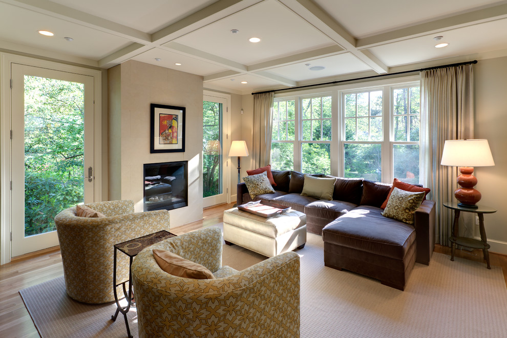 Traditional formal living room in DC Metro with beige walls and carpet.