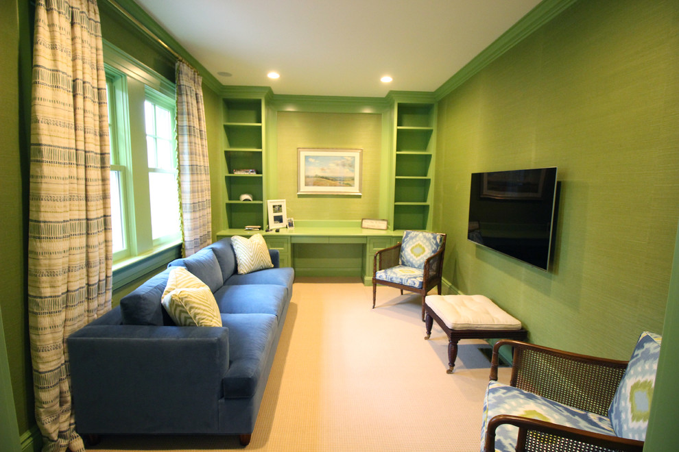 Small classic formal enclosed living room in New York with green walls, carpet, no fireplace and a wall mounted tv.