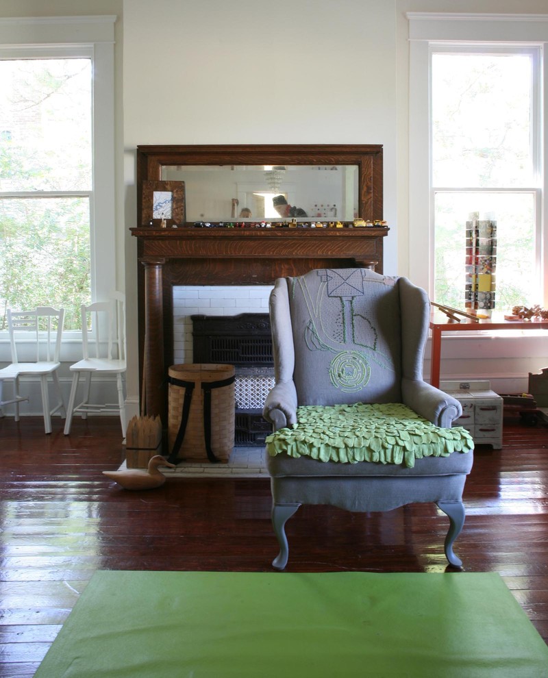Example of a trendy living room design in New York with white walls