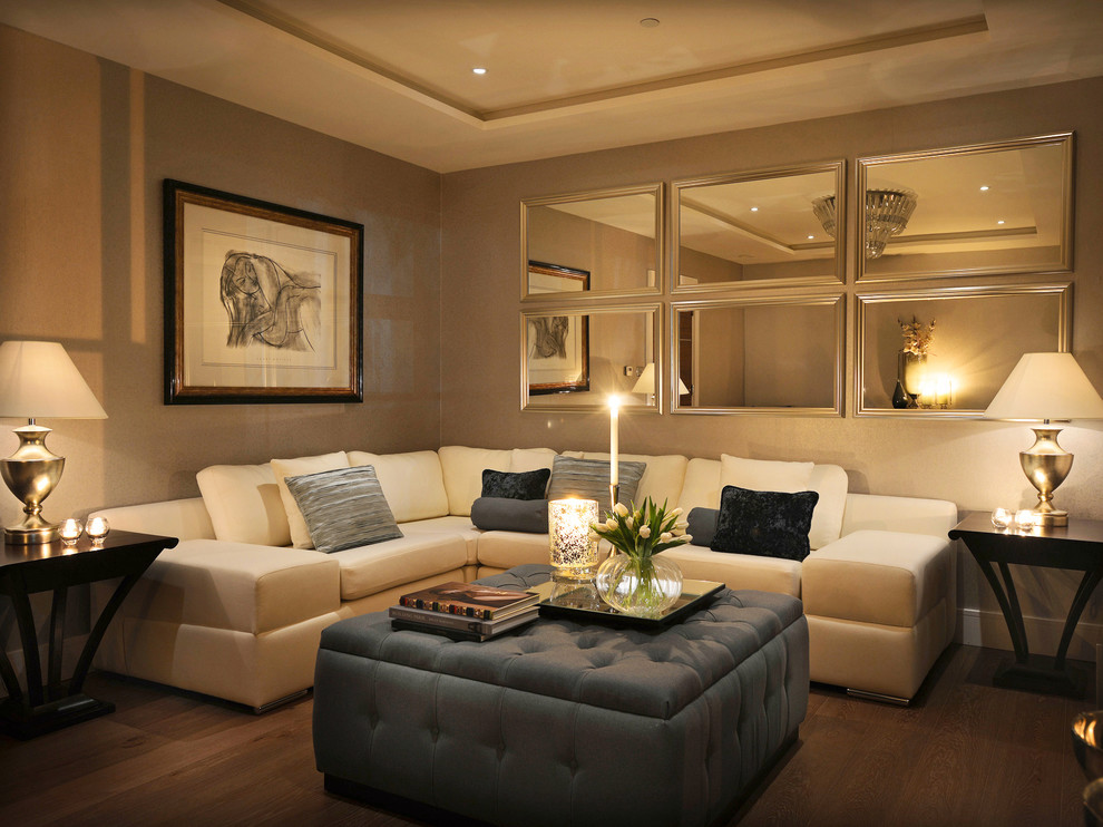 Inspiration for a contemporary living room in London with feature lighting.