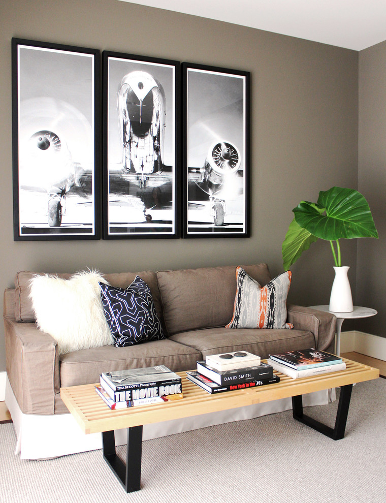 Living room - large contemporary formal and enclosed carpeted living room idea in New York with gray walls, a standard fireplace, a stone fireplace and no tv