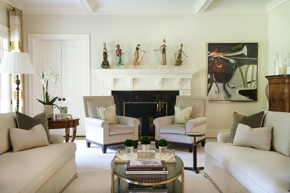 This is an example of a classic living room in New York with a standard fireplace, a stone fireplace surround and beige walls.