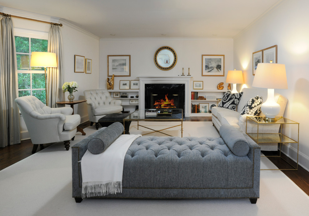 Design ideas for a classic living room in New York with white walls, dark hardwood flooring and a standard fireplace.