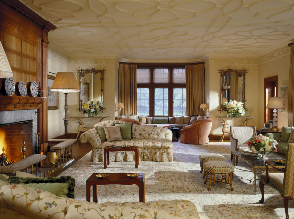 This is an example of a classic living room in New York with beige walls and a standard fireplace.