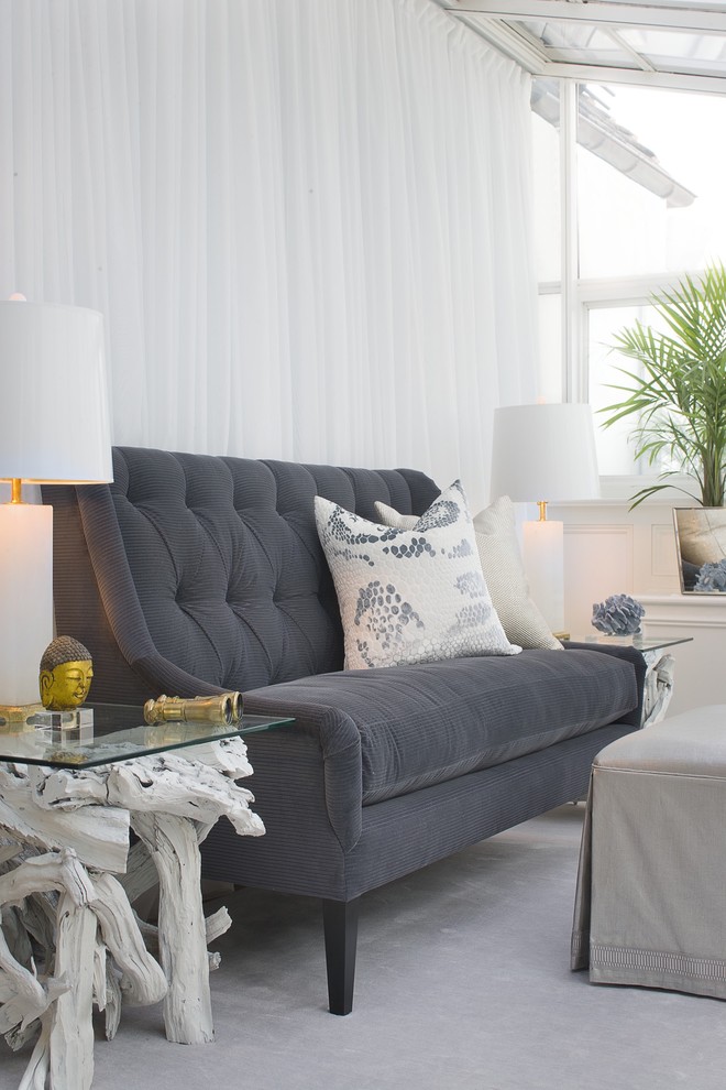 Example of a transitional living room design in New York