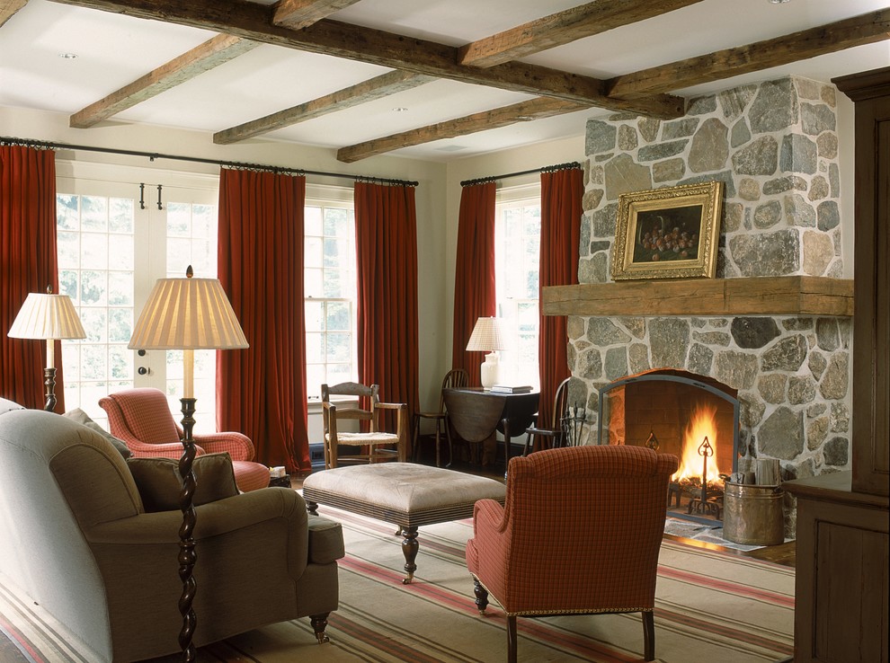 Inspiration for a traditional formal living room curtain in New York with a standard fireplace.
