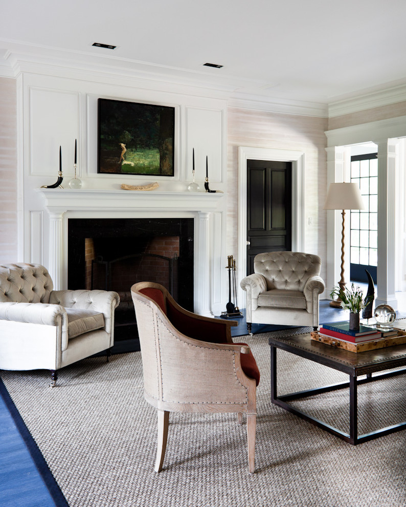 Inspiration for a classic formal living room in New York with a standard fireplace, blue floors and feature lighting.