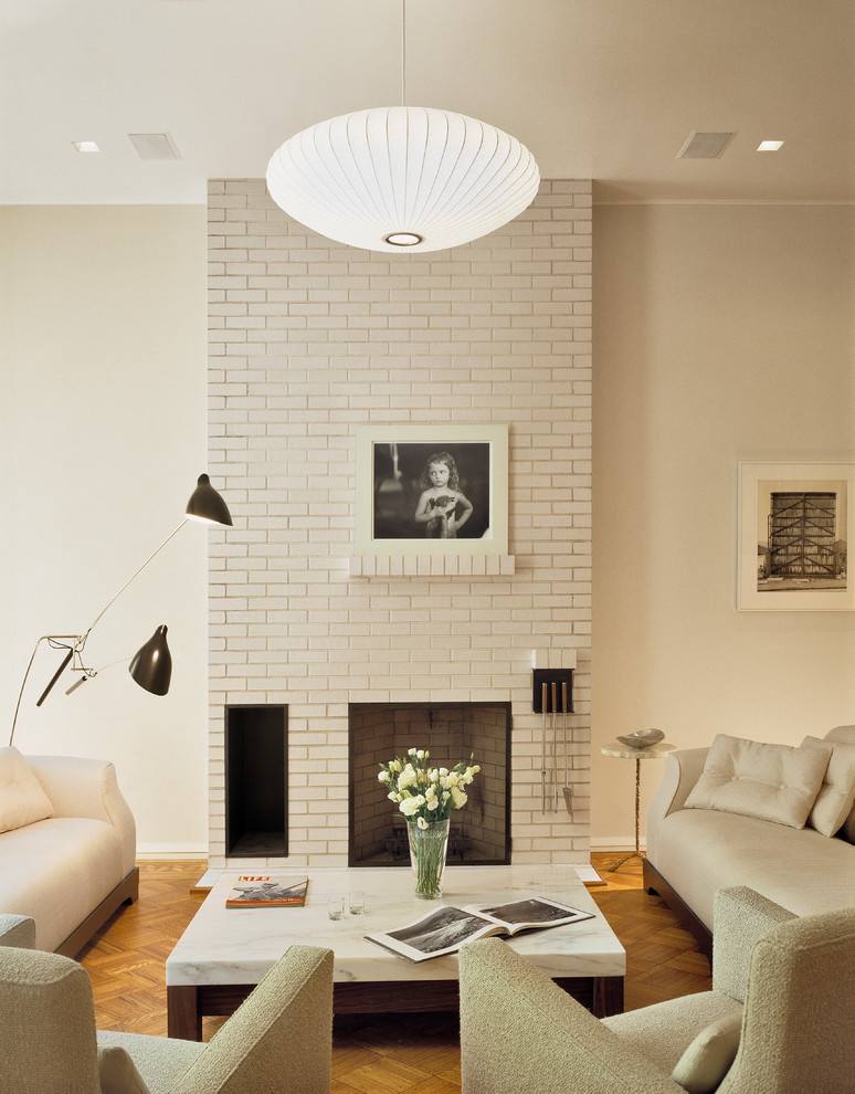 Inspiration for a modern living room remodel in New York with white walls and no tv