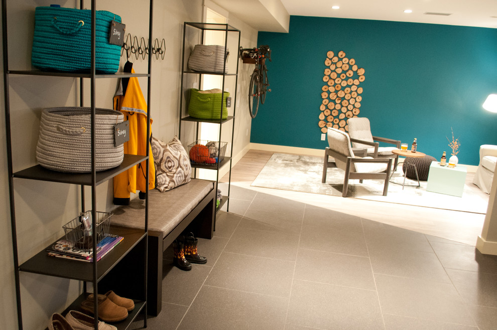 Example of a mid-sized eclectic enclosed porcelain tile and brown floor living room design in Seattle with blue walls