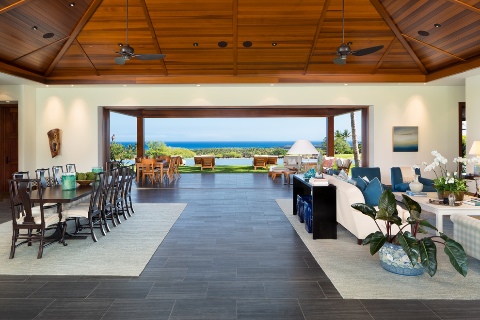 Expansive world-inspired formal open plan living room in Hawaii.