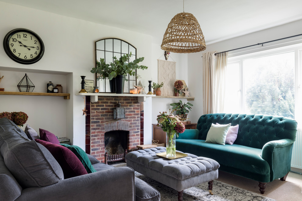 Design ideas for a small contemporary grey and teal enclosed living room in London with white walls, carpet, a standard fireplace, a brick fireplace surround and beige floors.