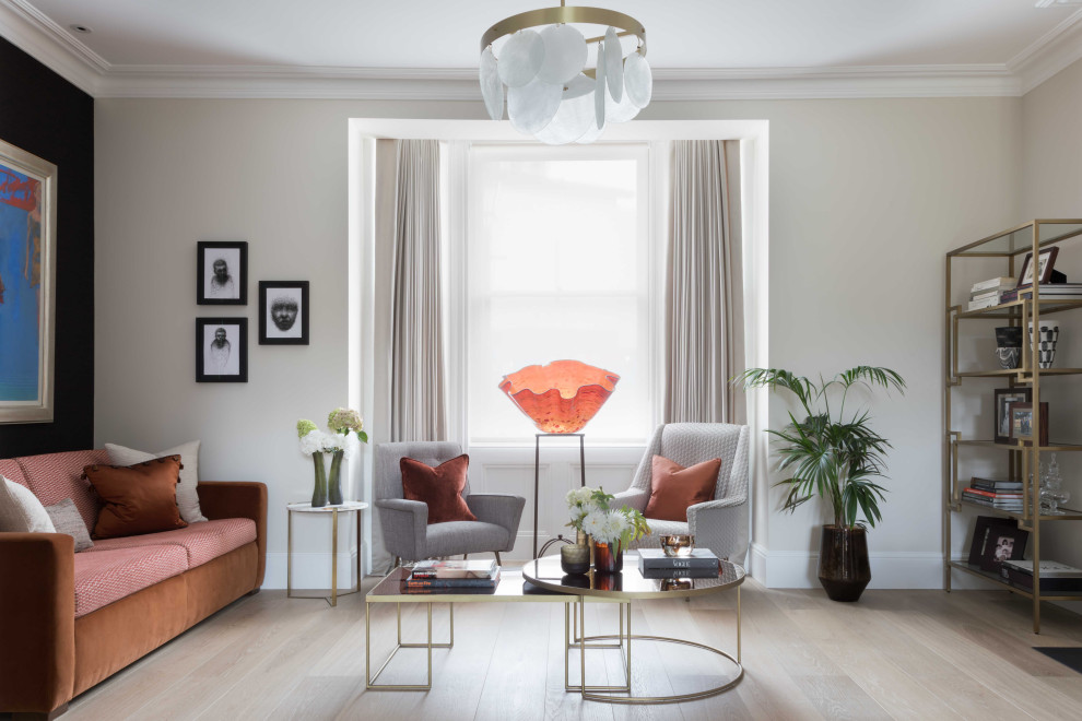 Mid-sized trendy beige floor living room photo in London with beige walls