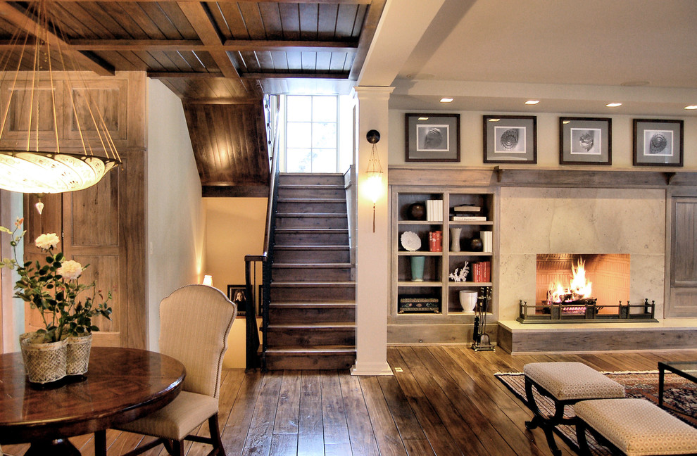 Inspiration for a rustic living room in Chicago with dark hardwood flooring and a standard fireplace.