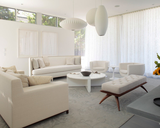 Diseño de salón para visitas tipo loft moderno de tamaño medio con paredes blancas