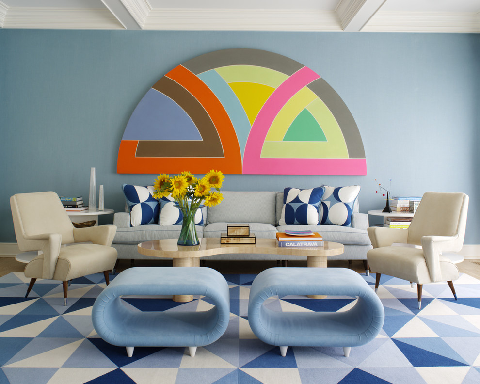 Inspiration for a mid-century modern living room remodel in New York with blue walls