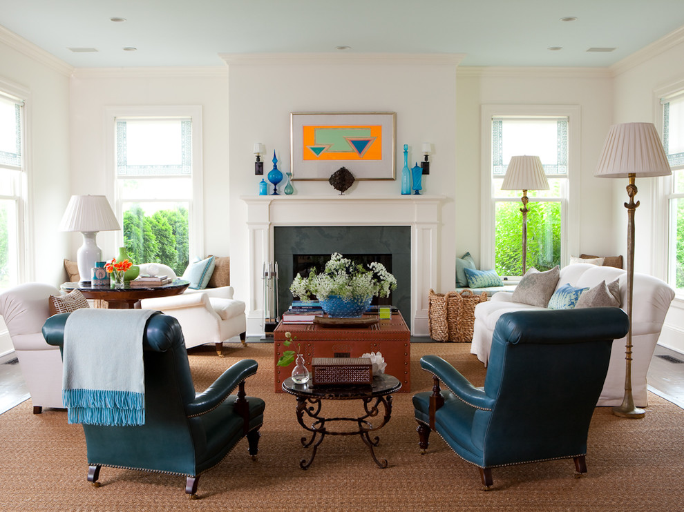 Inspiration for a large transitional living room remodel in New York with white walls and a standard fireplace