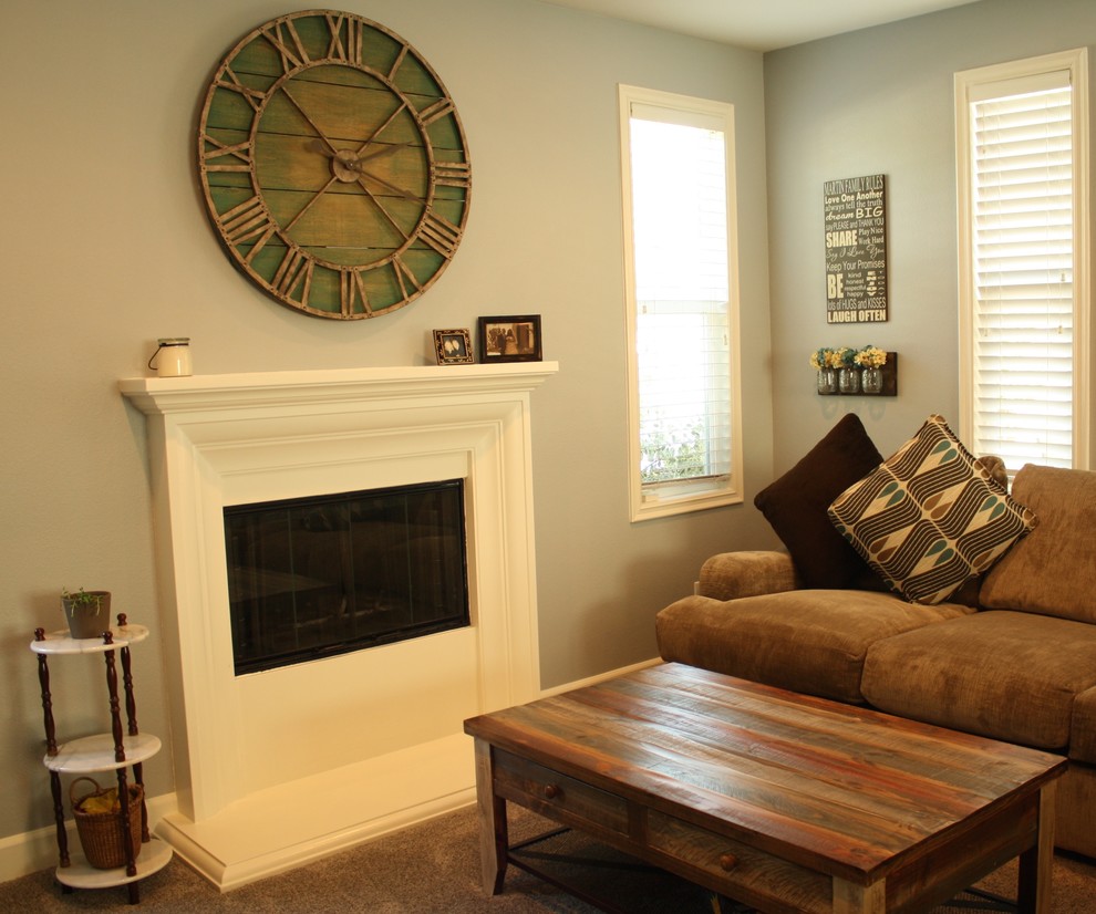 Photo of a medium sized farmhouse grey and teal open plan living room in Orange County with grey walls and carpet.