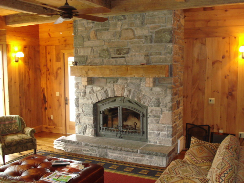 Traditional Living Room With Hand Hewn Beams