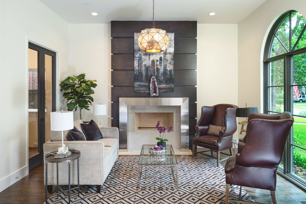 Inspiration for a transitional formal and enclosed dark wood floor living room remodel in Dallas with beige walls, a standard fireplace, a stone fireplace and no tv