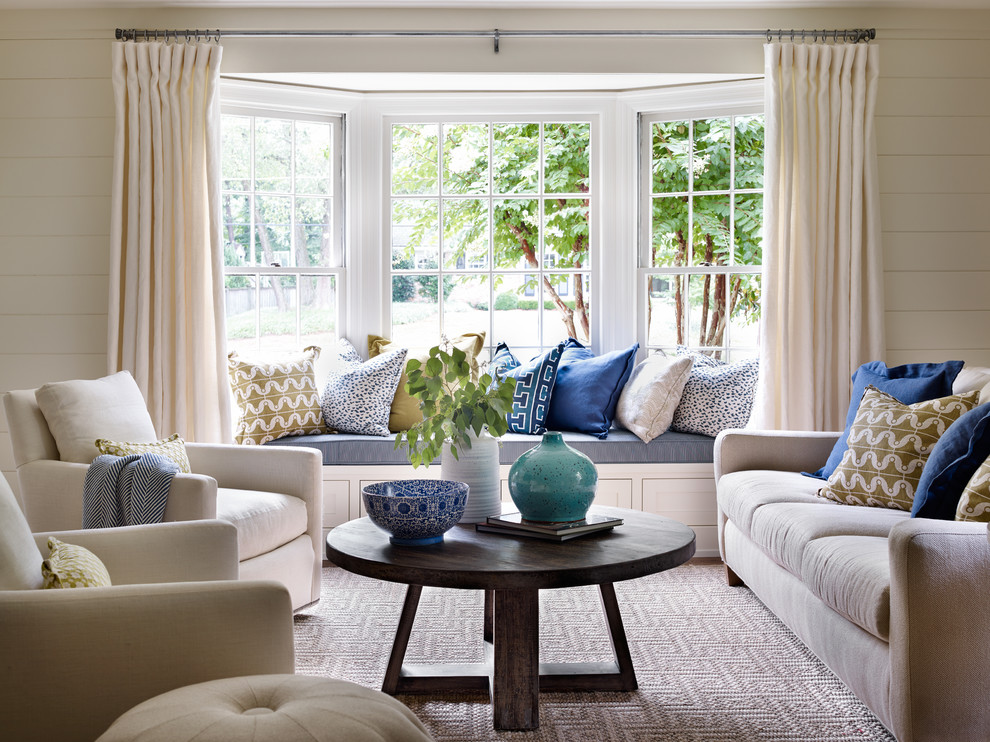 Photo of a classic formal living room in Atlanta with beige walls and carpet.