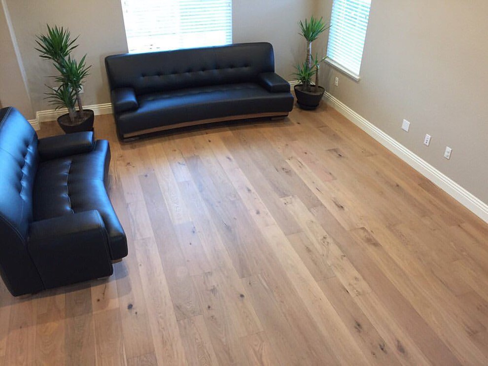 Inspiration for a small traditional formal enclosed living room in Sacramento with grey walls, medium hardwood flooring, no fireplace and brown floors.