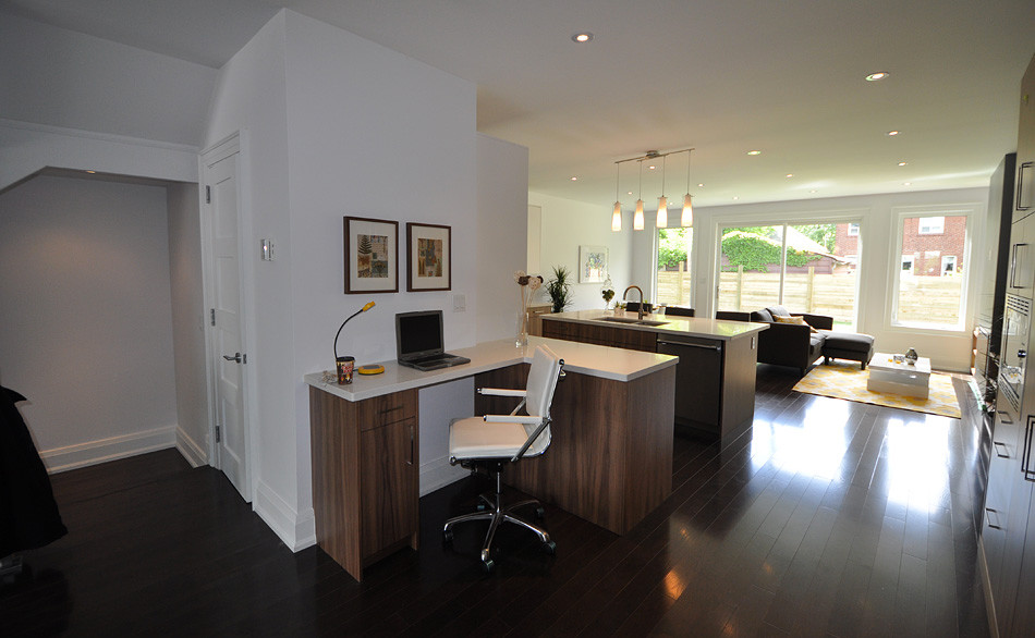 Photo of a medium sized contemporary formal open plan living room in Toronto with white walls, dark hardwood flooring, no fireplace, no tv and brown floors.