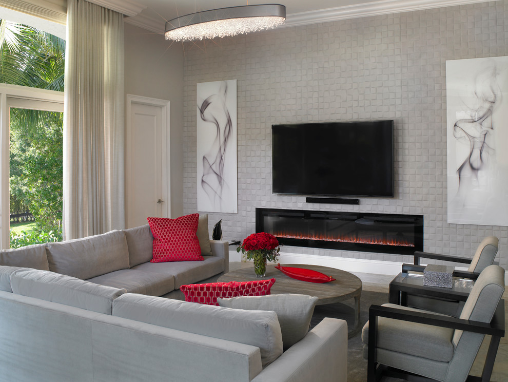 Стильный дизайн: изолированная гостиная комната среднего размера в современном стиле с музыкальной комнатой, серыми стенами, мраморным полом, горизонтальным камином, фасадом камина из бетона, телевизором на стене и серым полом - последний тренд