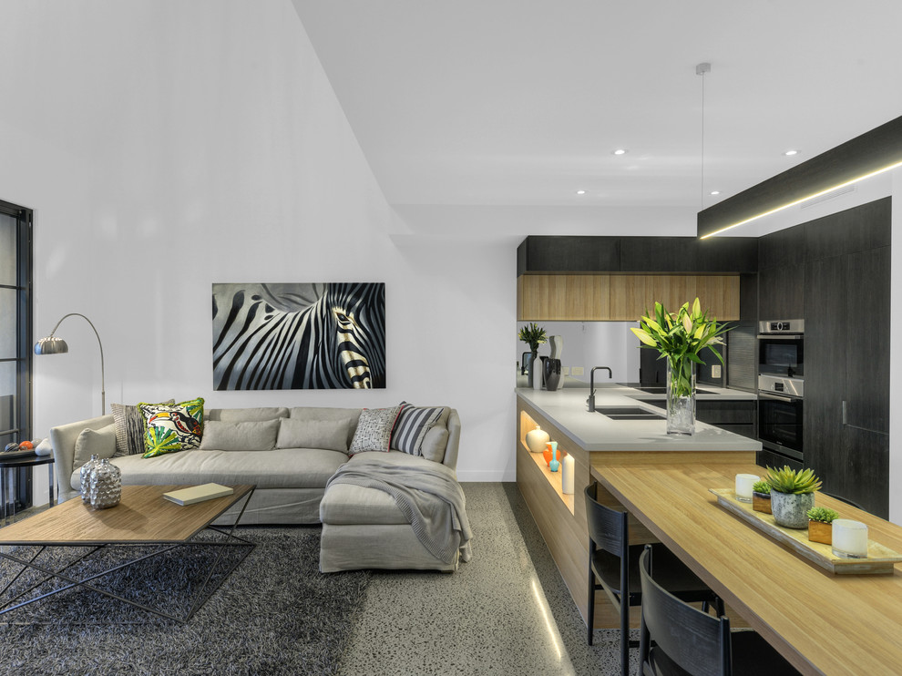 Свежая идея для дизайна: гостиная комната среднего размера в стиле лофт с бетонным полом - отличное фото интерьера