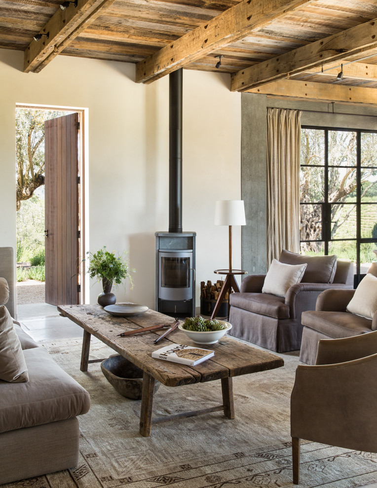 Living room - farmhouse open concept living room idea in San Francisco with beige walls