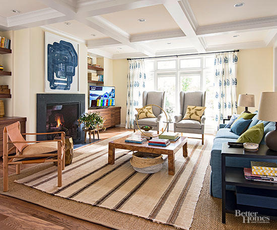 Example of a trendy enclosed living room design in Minneapolis with a standard fireplace, beige walls and no tv