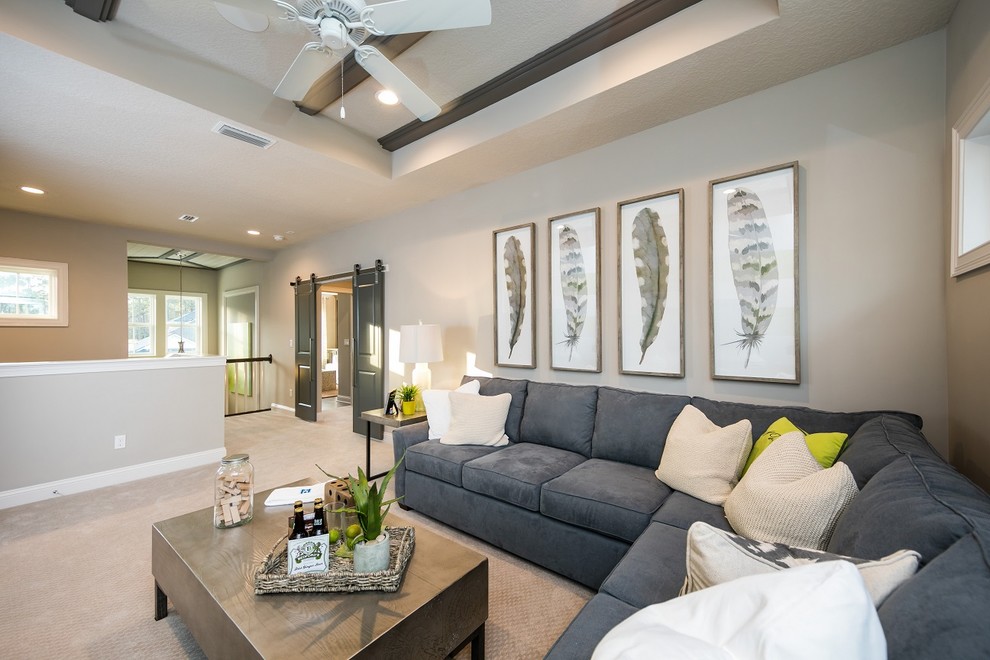 Inspiration for a transitional loft-style carpeted living room remodel in Jacksonville with brown walls