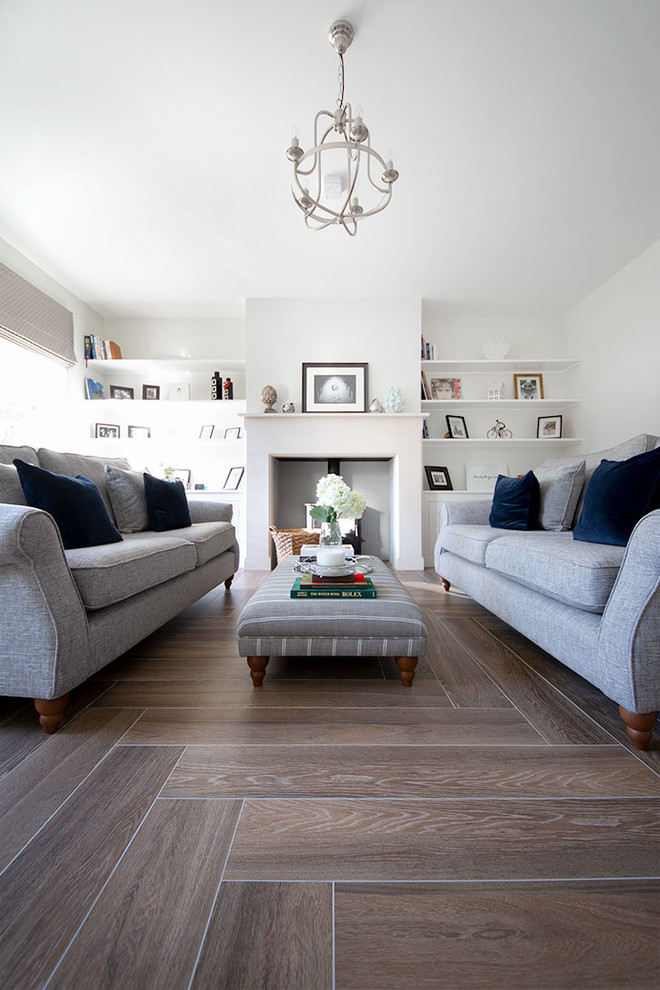 This is an example of a large rural living room in Other with porcelain flooring and brown floors.