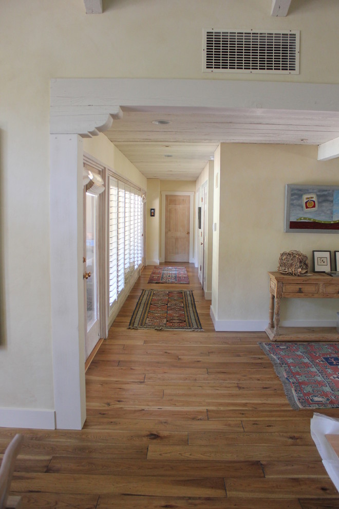 Example of an arts and crafts light wood floor living room design in San Francisco with beige walls