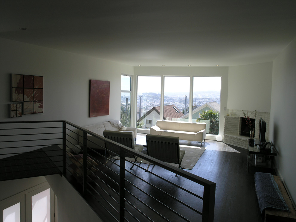 Example of a mid-sized trendy open concept dark wood floor living room design in San Francisco