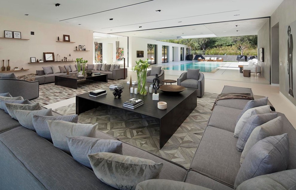 Inspiration for a huge contemporary open concept porcelain tile living room remodel in Los Angeles with white walls