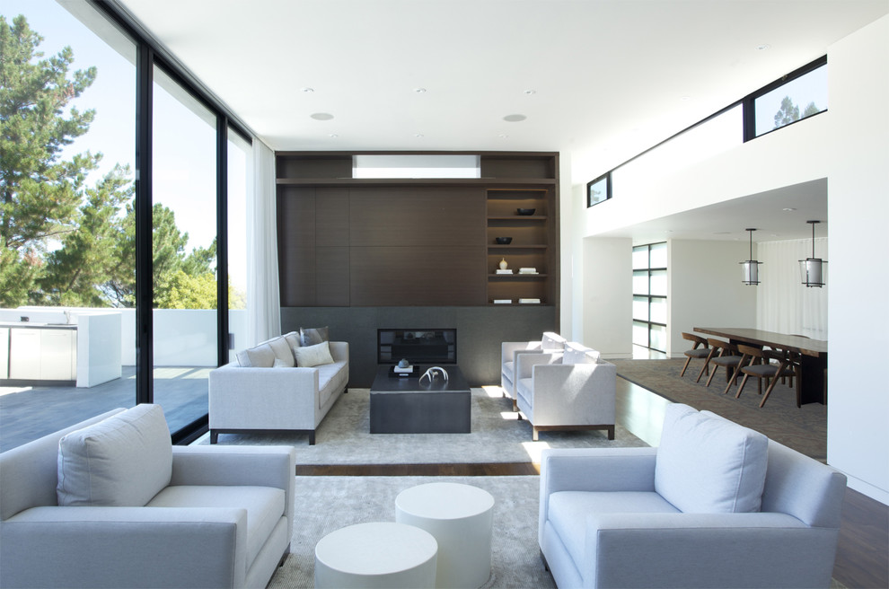 Immagine di un soggiorno moderno aperto con tappeto