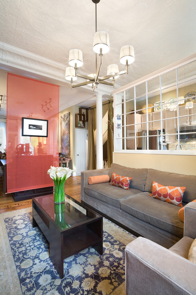 Inspiration for a timeless living room remodel in New York with beige walls
