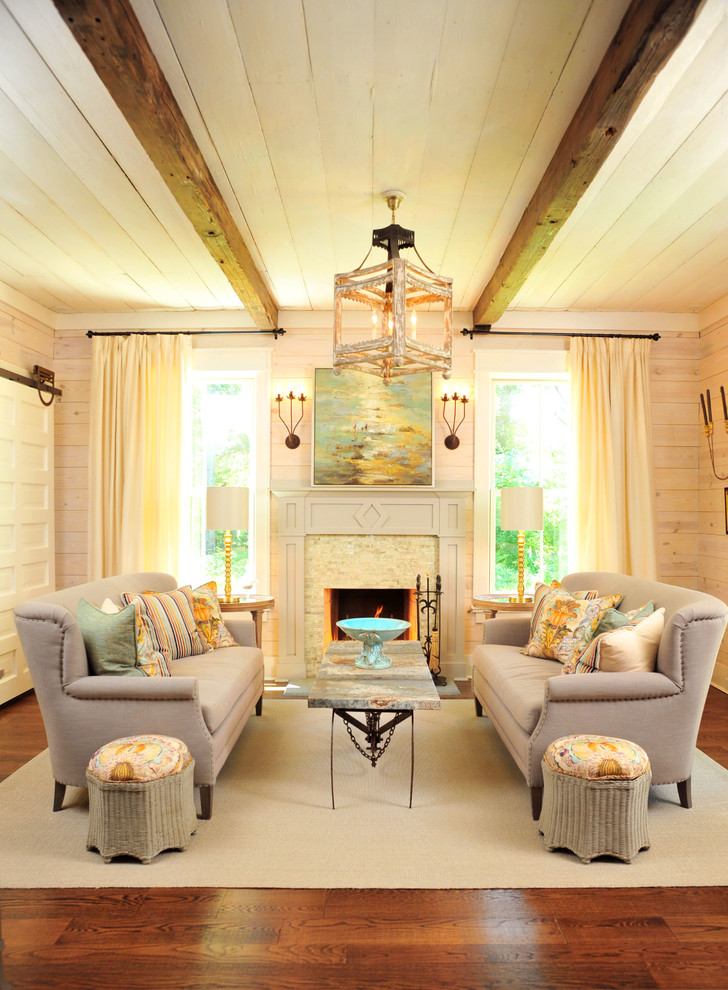 Inspiration pour un salon rustique avec un manteau de cheminée en carrelage, une salle de réception, un mur blanc, un sol en bois brun et une cheminée standard.